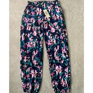 womens small power pants with elastic waist and elastic ankle. Brand new unworn